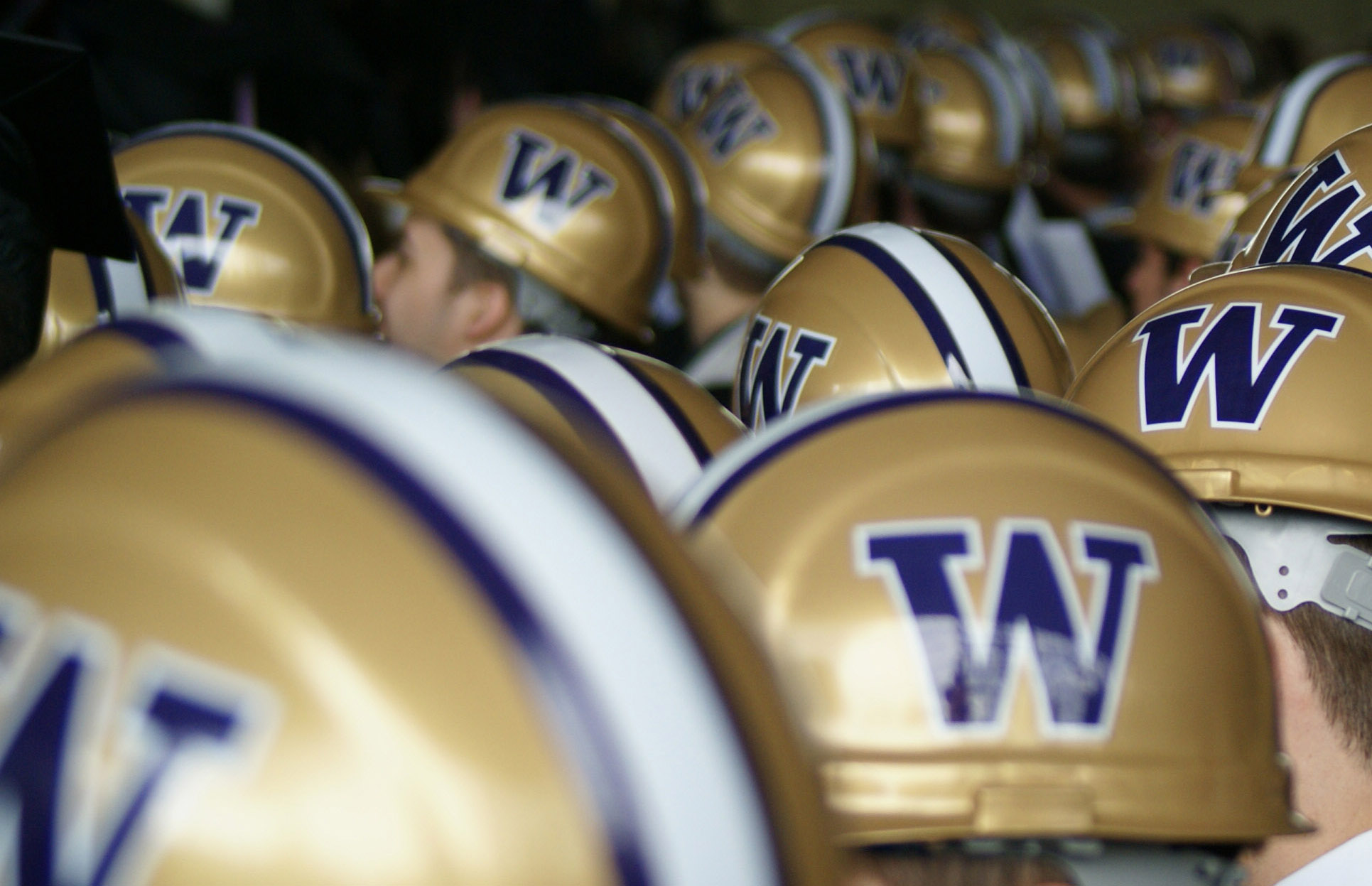 Construction helmets with the UW logo on the side