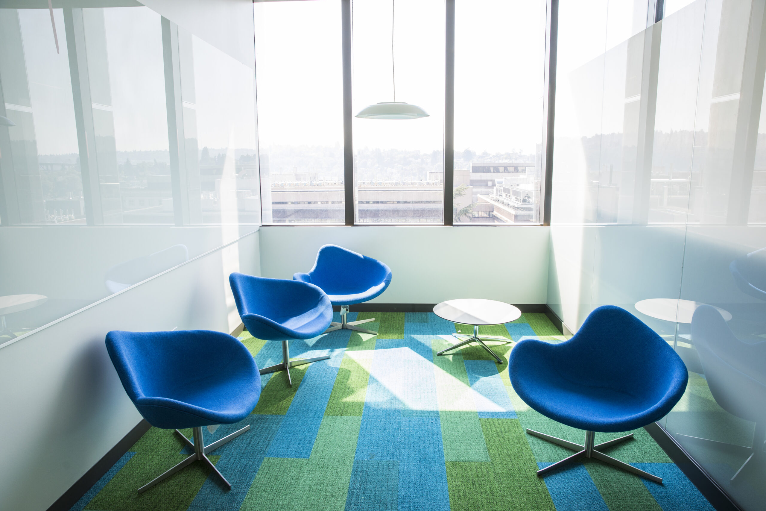 A room with blue chairs inside the Life Sciences Building