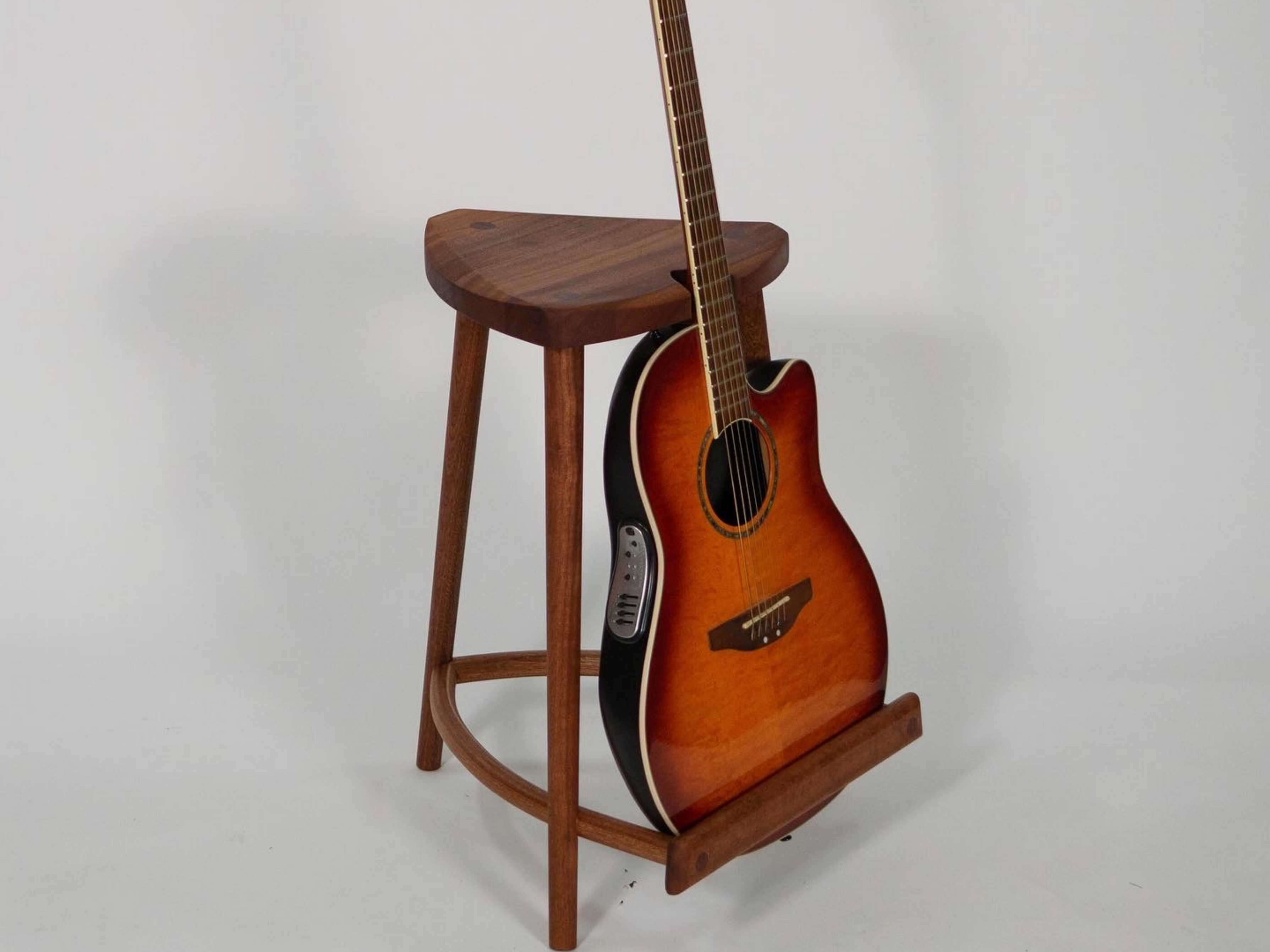 Stool guitar holder designed by Addison