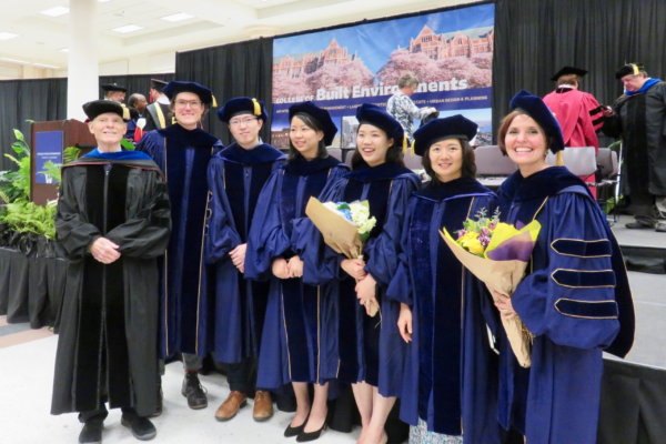 Dr. Bob at graduation with PhD students