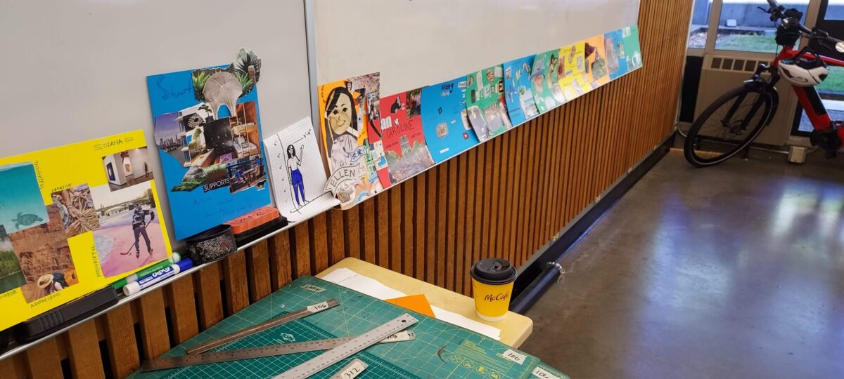 Students in a classroom looking at the instructor in the front of the room