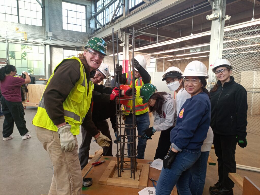 CBE students learning how to make reinforced concrete with rebars.