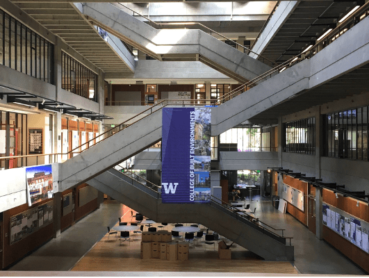 Interior of Gould Hall with a banner hanging on the stairs