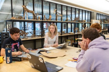 Students working together around a table