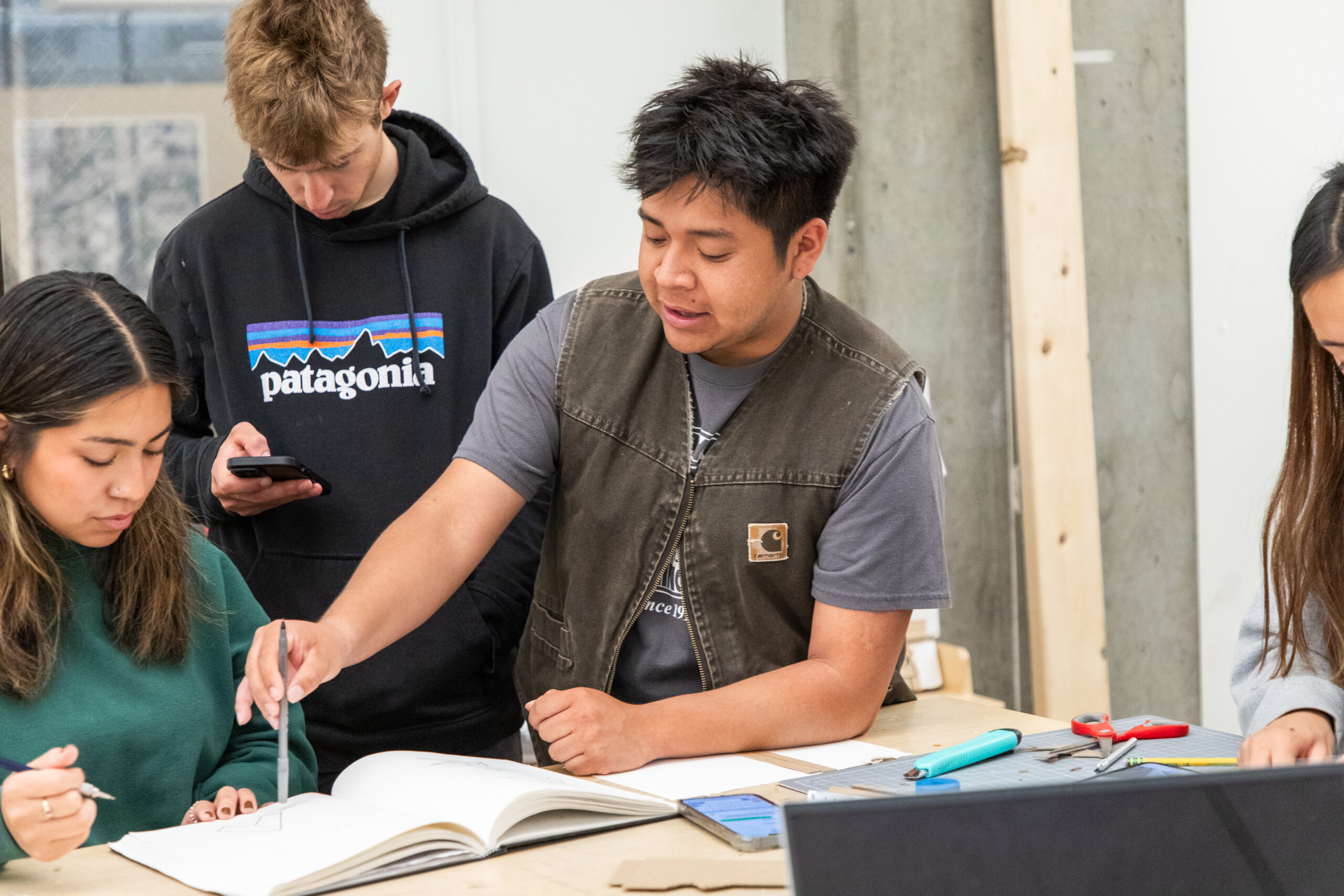 Students working together around a table