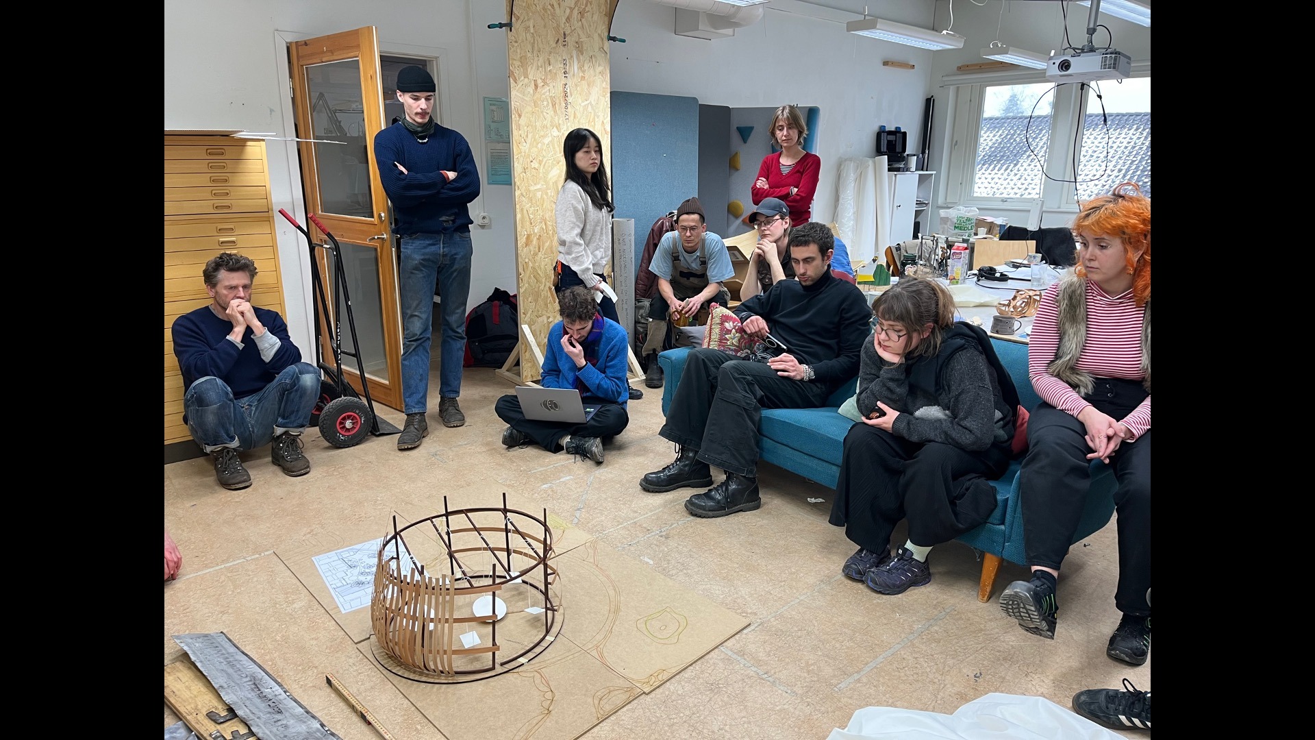 People looking at model