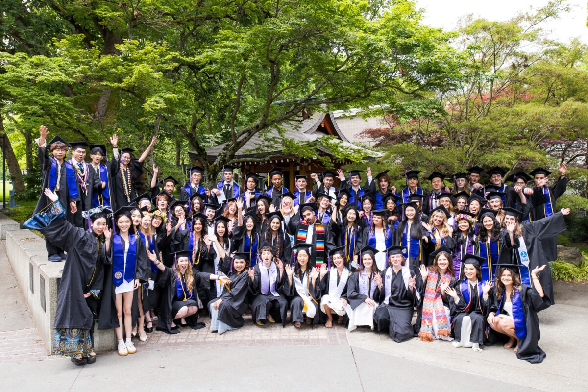 Group of graduates cheering