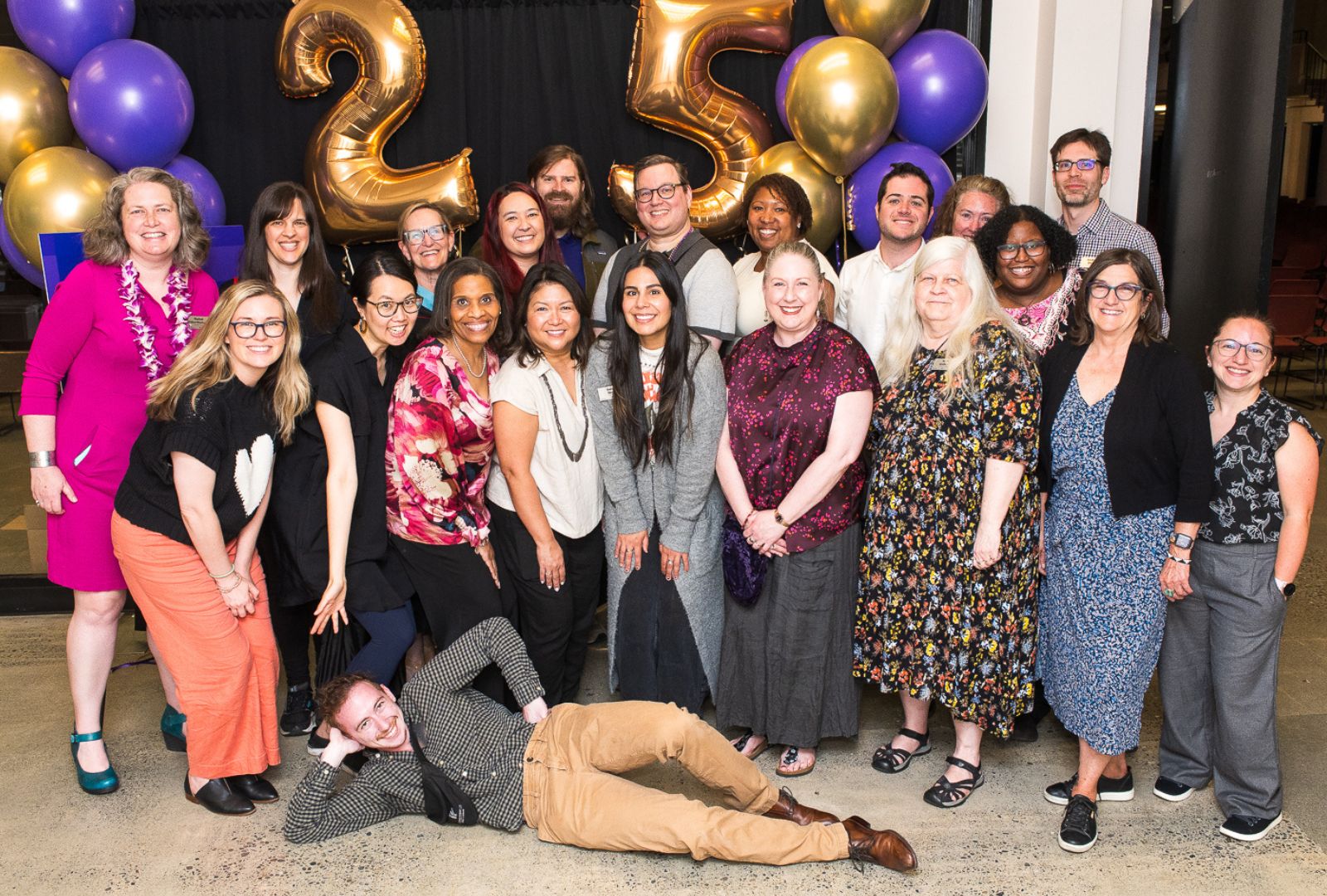 CBE Staff pose together during graduation ceremony