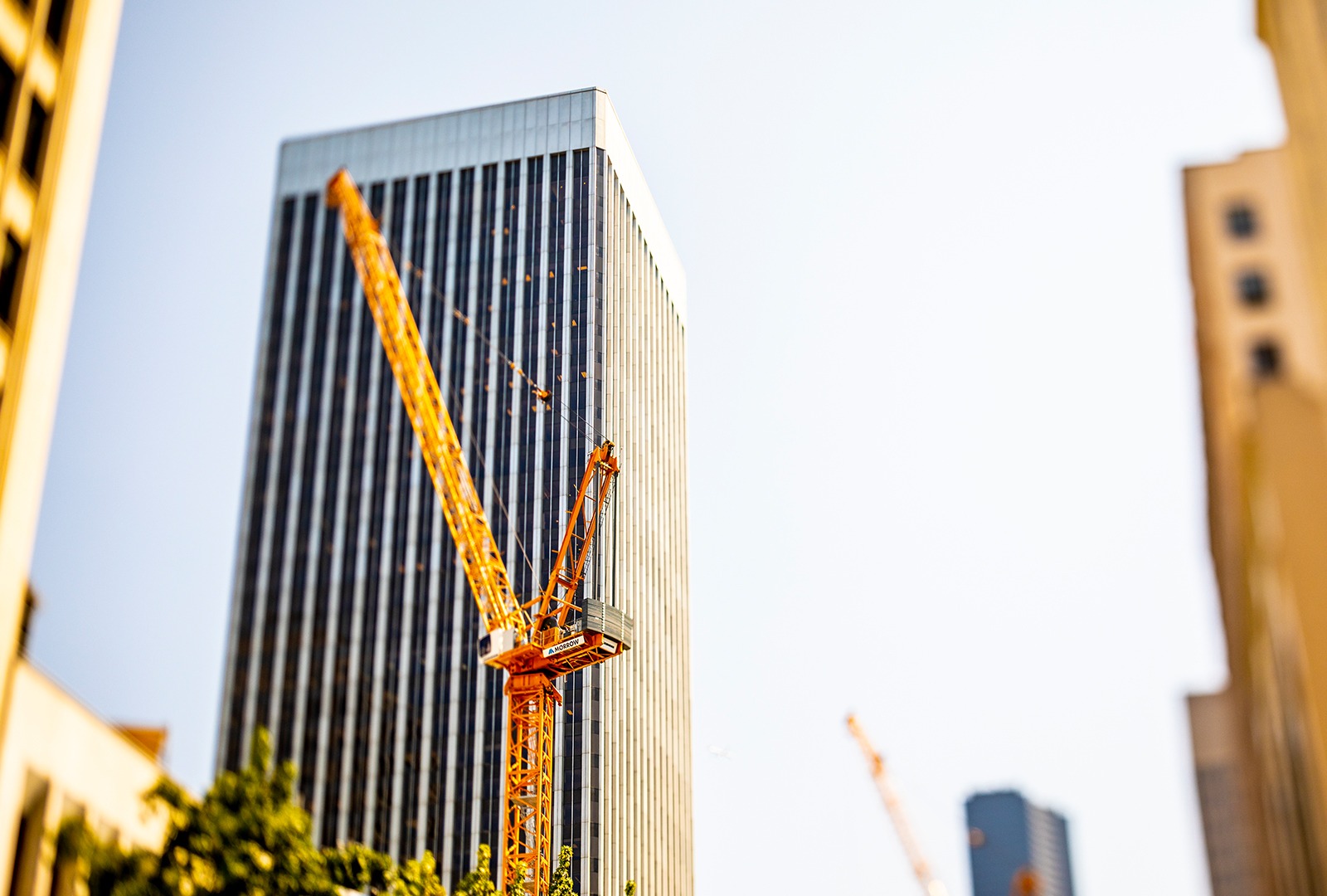 Crane in front of high rise in Seattle