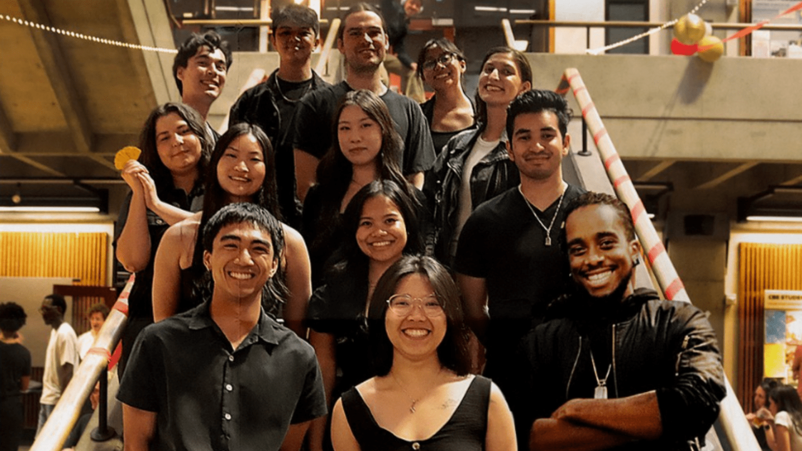 NOMAS students on stairs