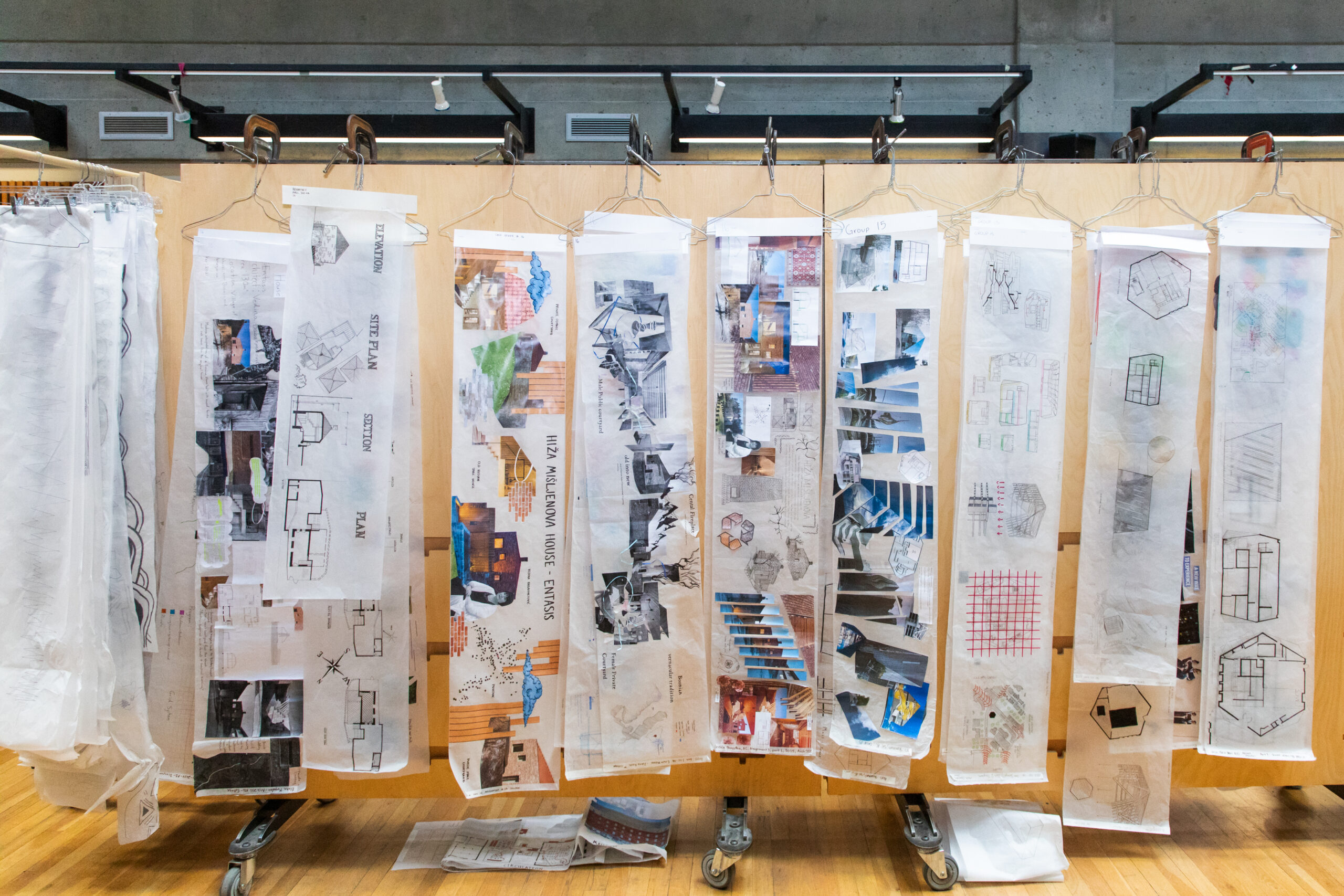 Diagrams hanging on a board