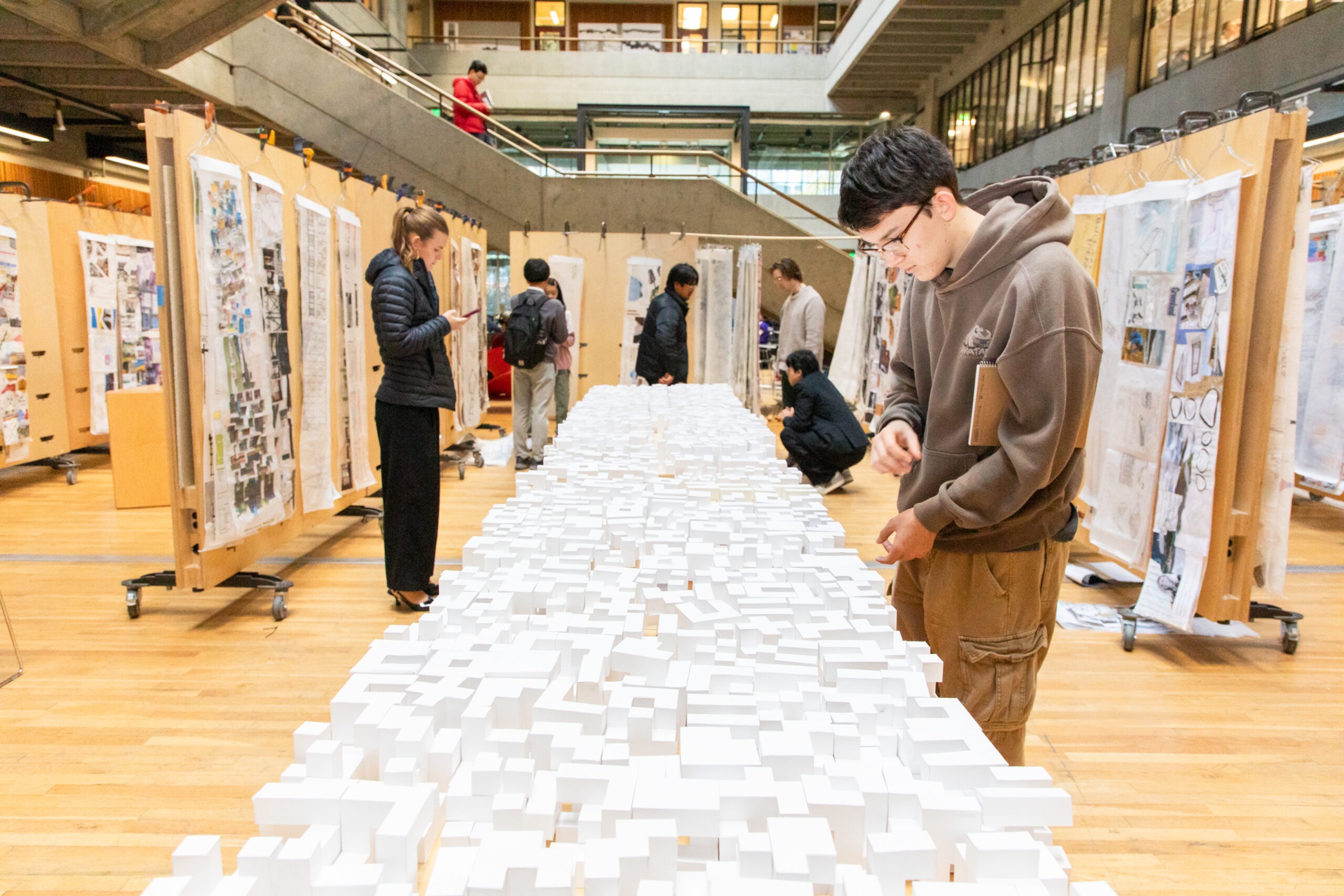 Students looking at geometric models