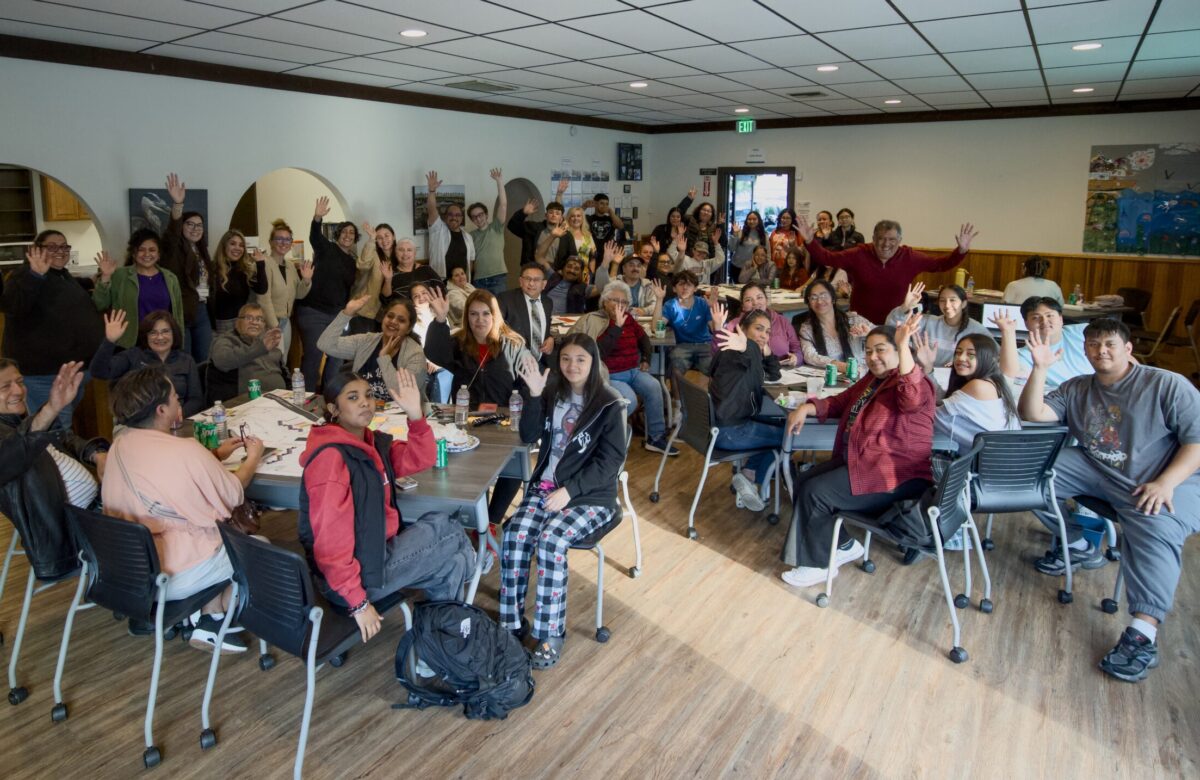 Group of people waving