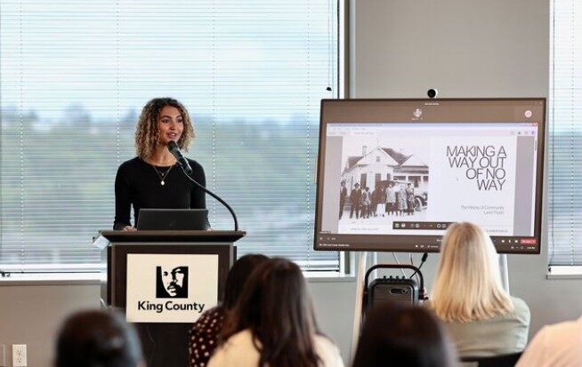 Jannon-Shields speaking in front of a crowd