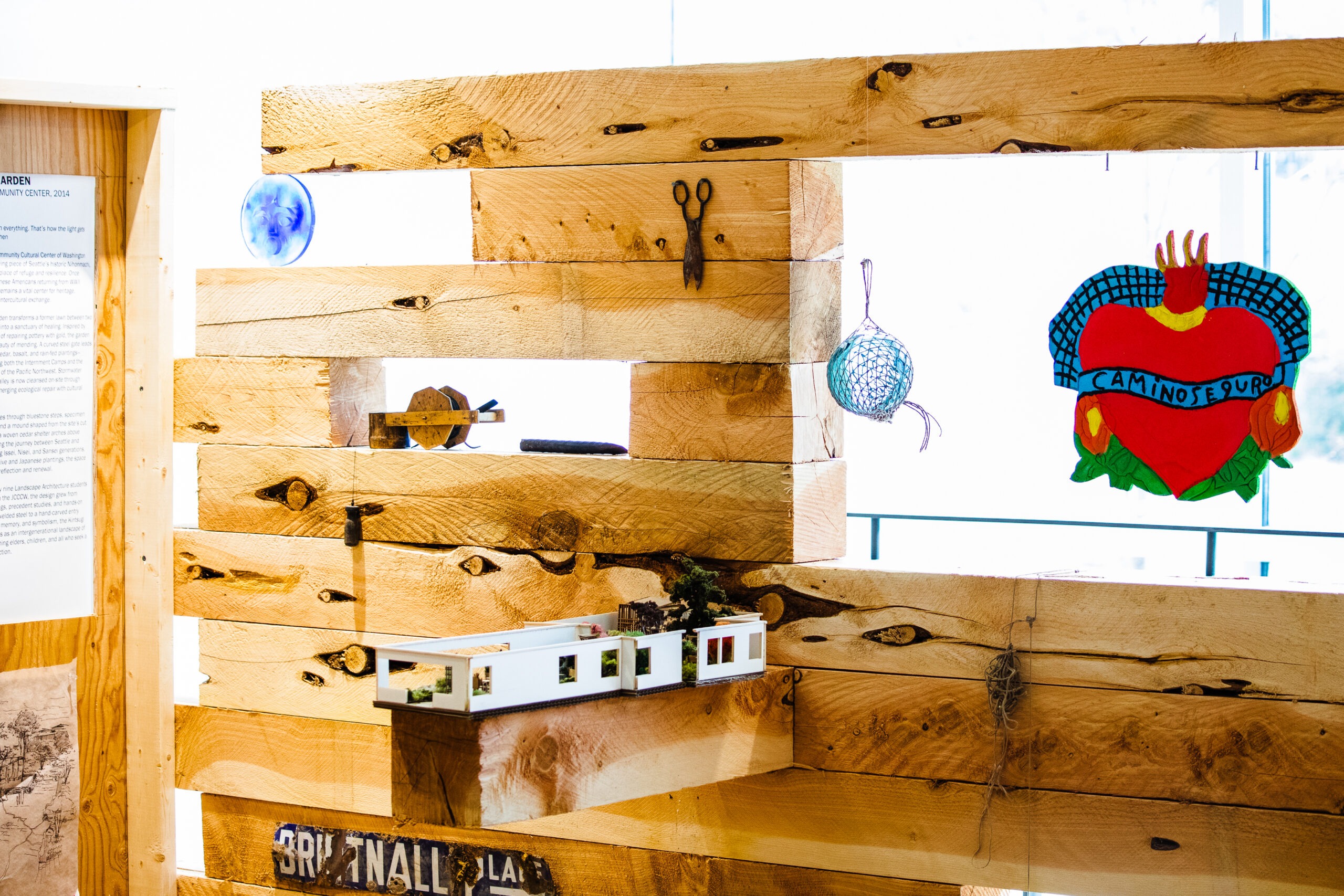 Display pieces against a wooden wall