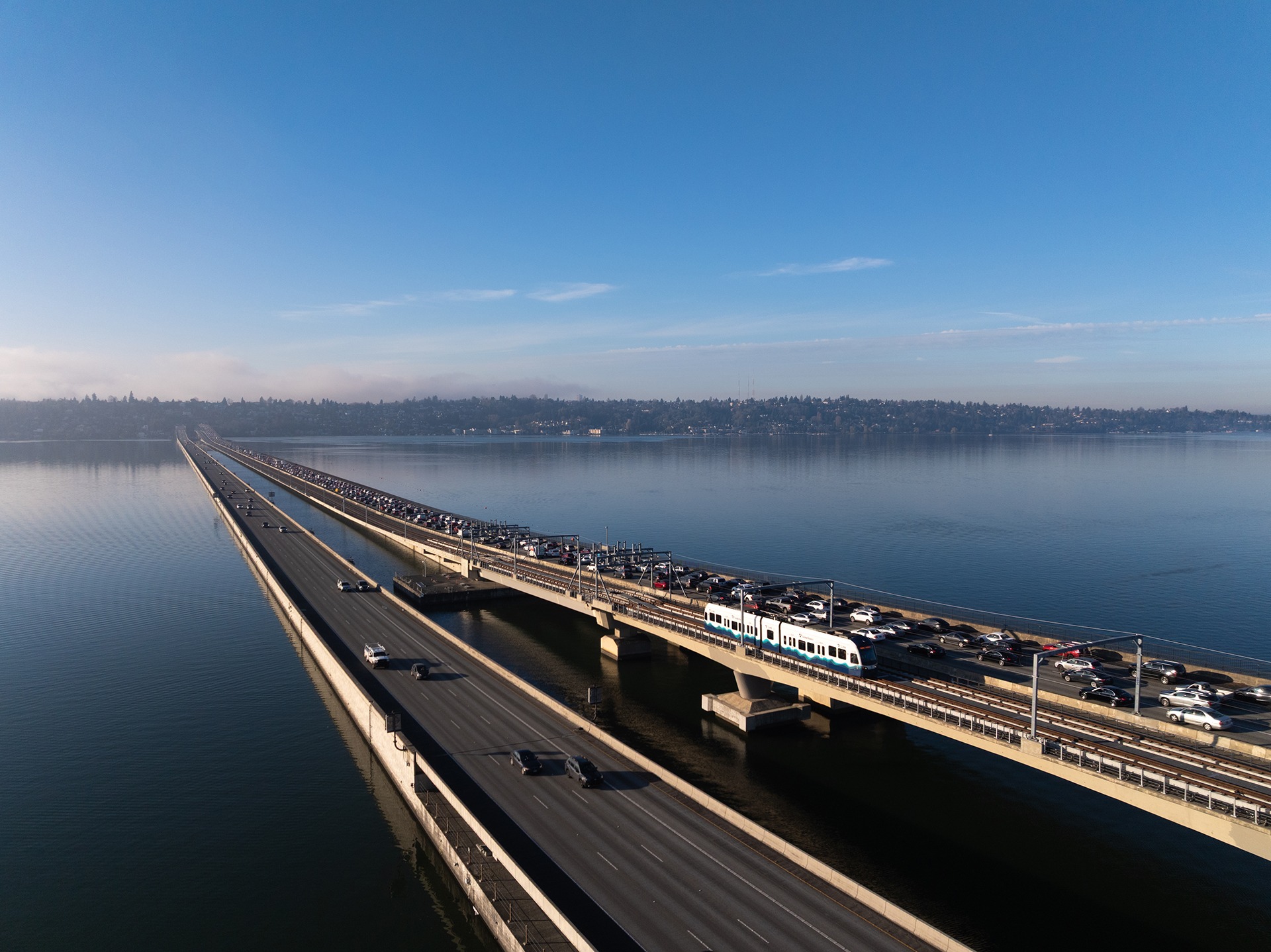 Light rail crossing Lake Washington on floating bridge
