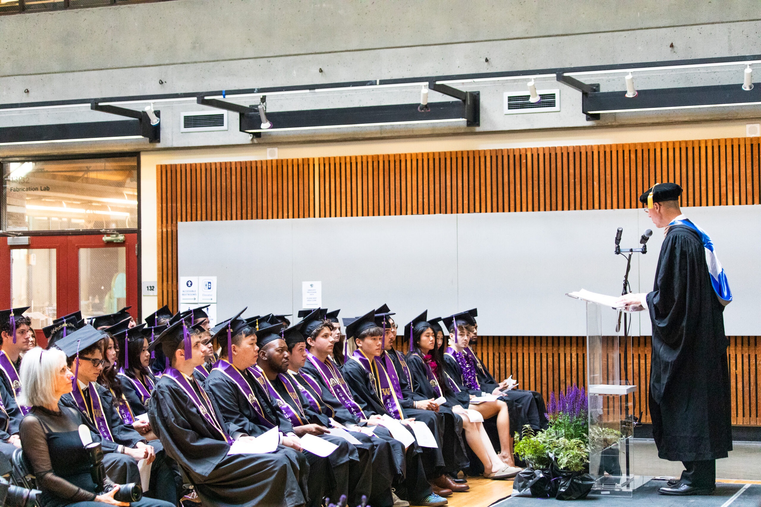 Chair Shannon Affholter speaking to graduates