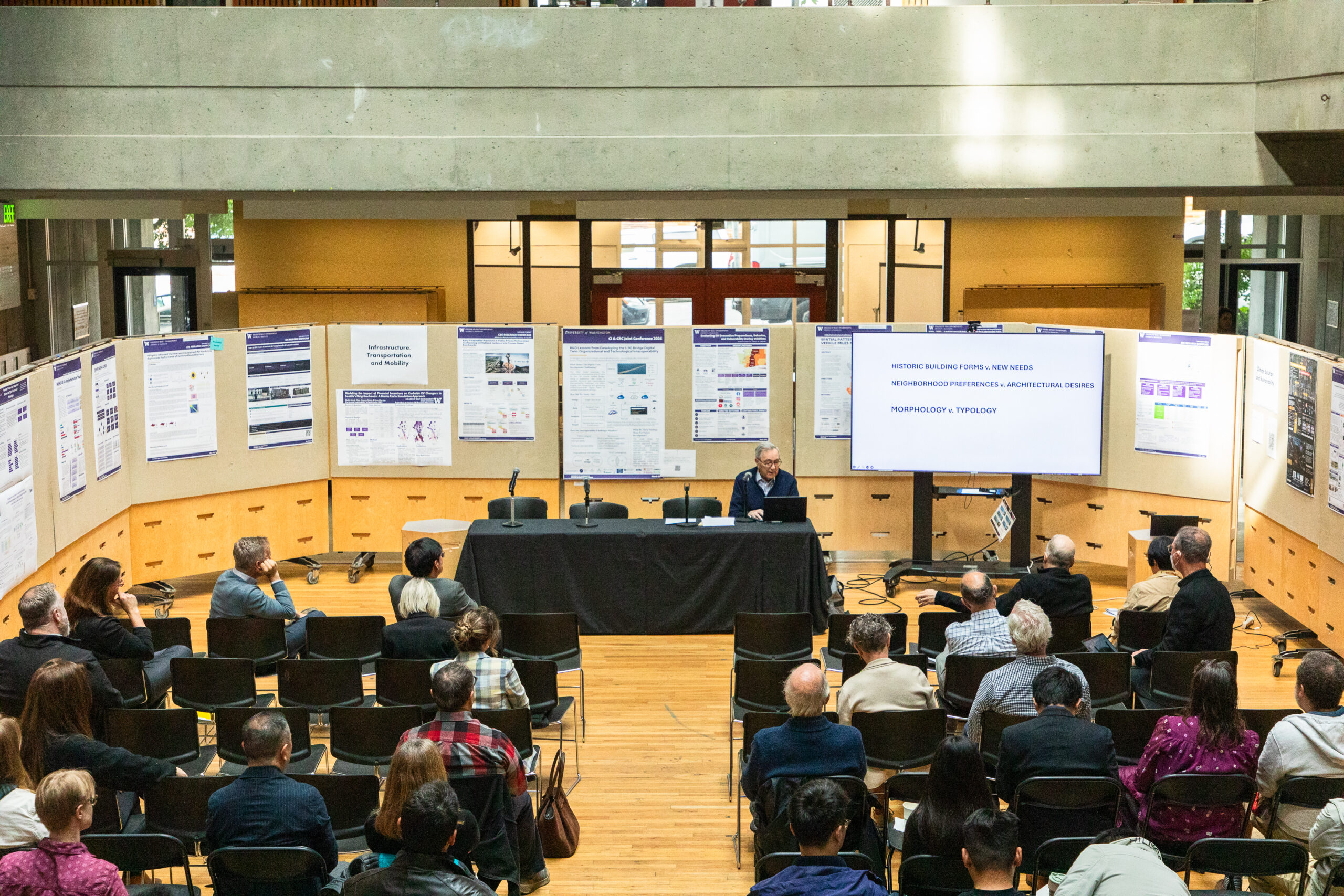 Speaker presents in front of audience